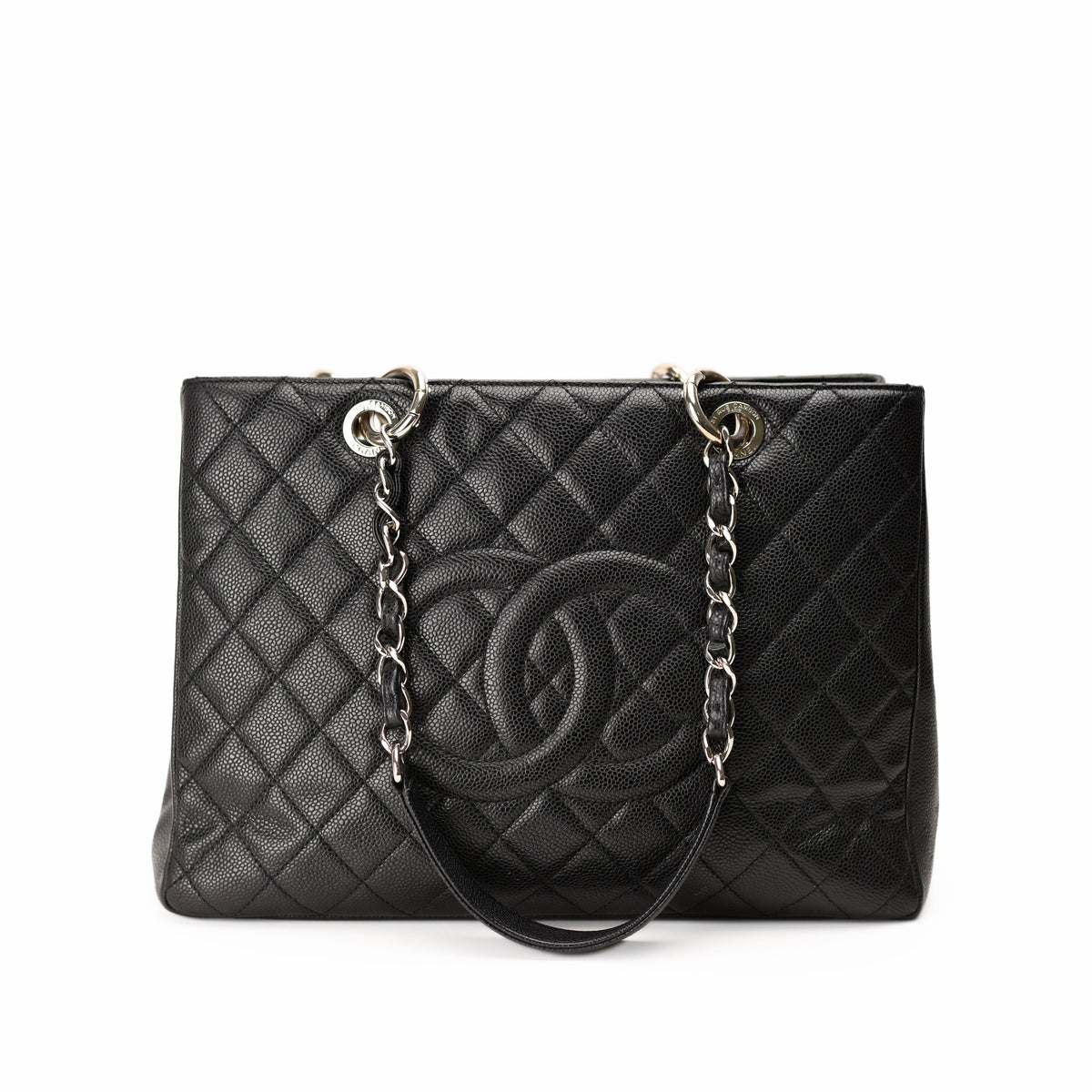 Black quilted caviar leather Chanel tote bag with silver chain straps. curated Pre-loved Luxury by Myluxe in Helsinki.