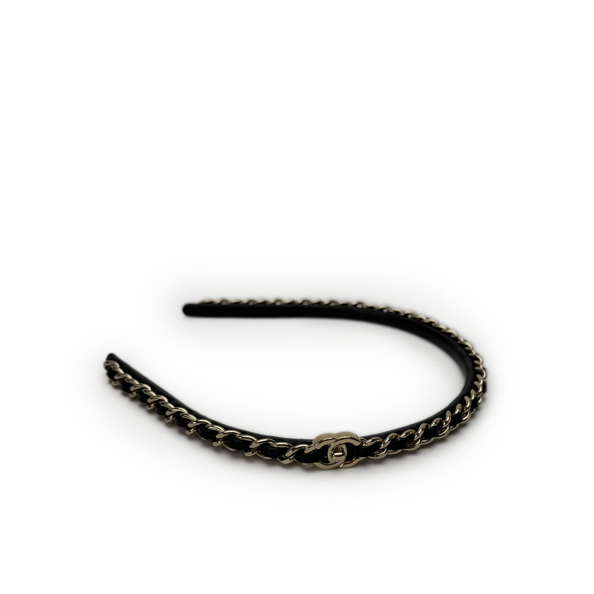 Black Chanel headband with gold chain detail, curated Pre-loved Luxury by Myluxe in Helsinki.