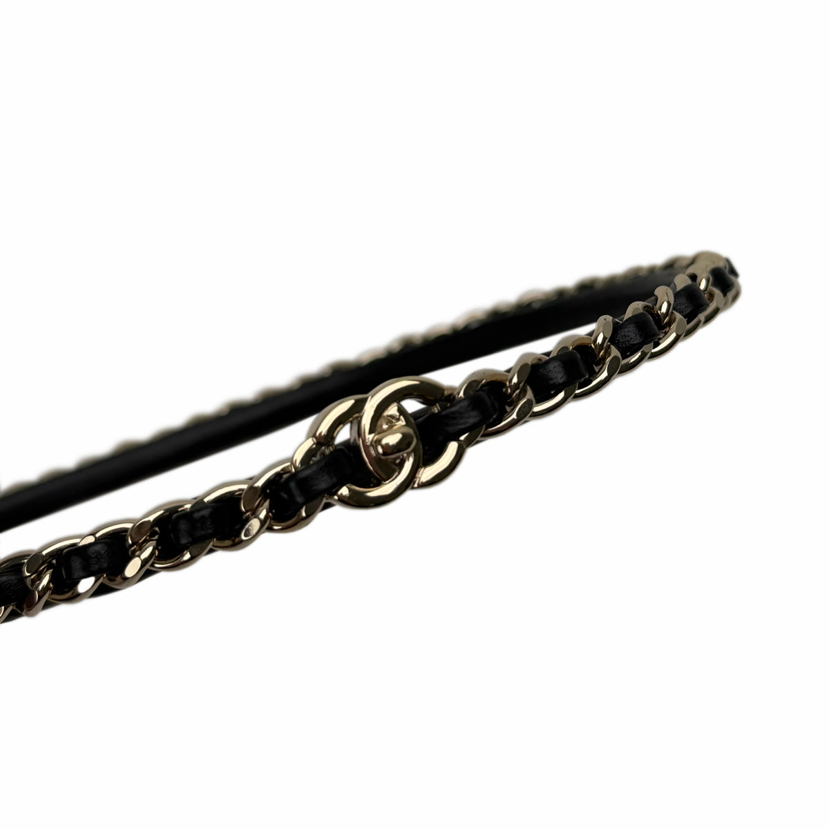 Chanel gold-tone interlocking CC logo black leather chain bracelet, curated Pre-loved Luxury by Myluxe in Helsinki.