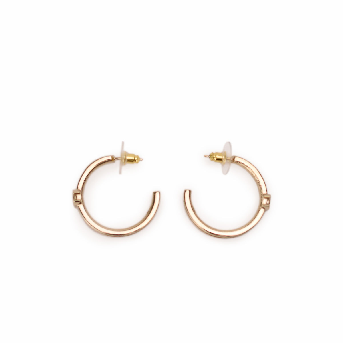 Gold-tone hoop earrings with secure butterfly backs. curated Pre-loved Luxury by Myluxe in Helsinki.