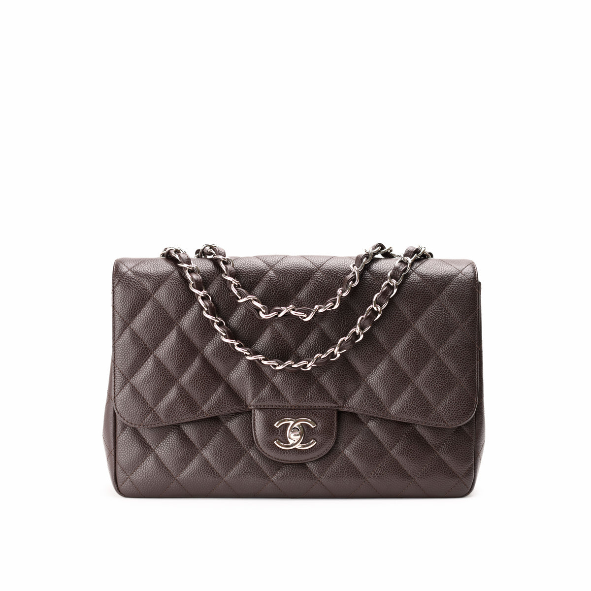 Chanel quilted brown leather flap bag with silver chain strap, curated Pre-loved Luxury by Myluxe in Helsinki.