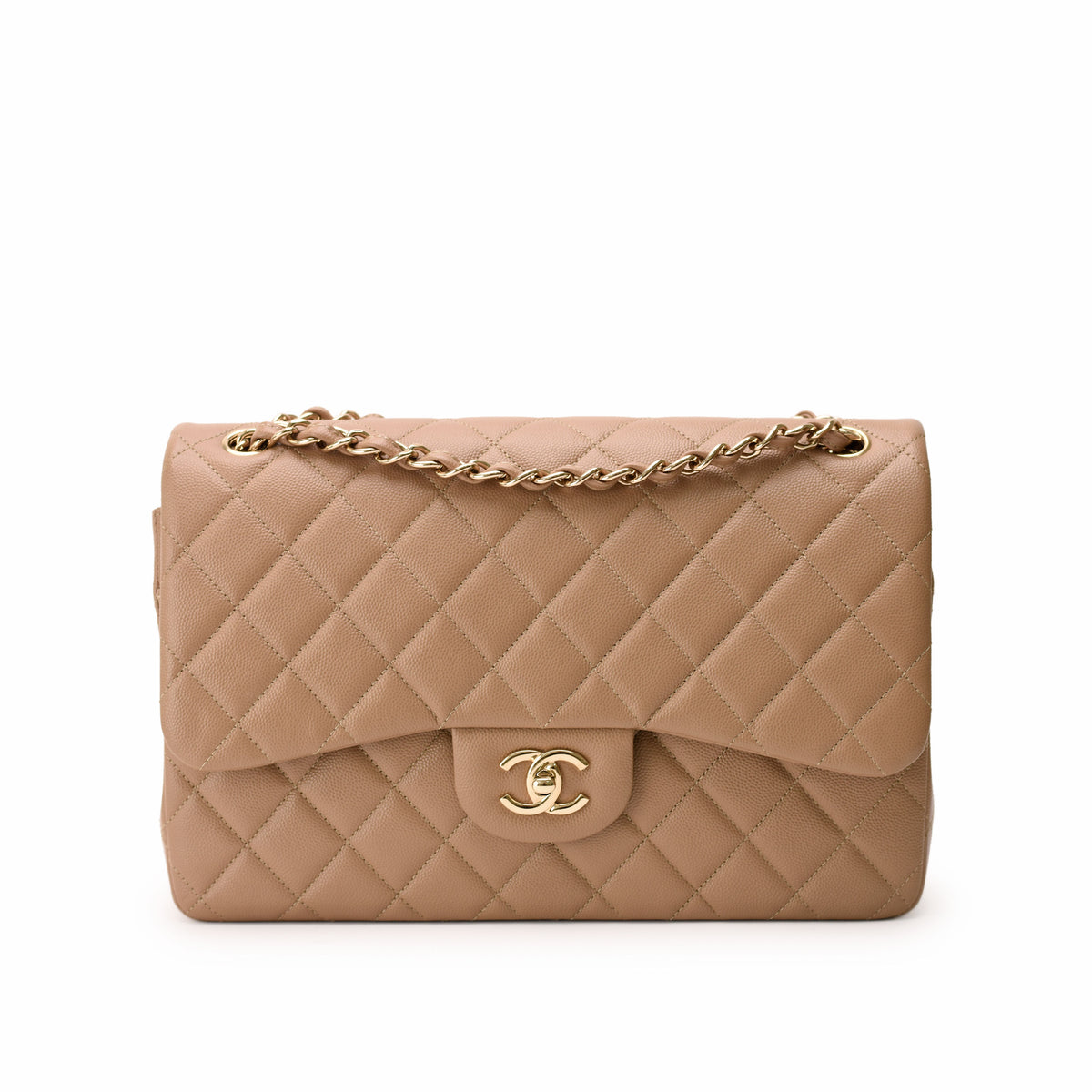 Beige quilted leather Chanel flap bag with gold chain strap, curated Pre-loved Luxury by Myluxe in Helsinki.