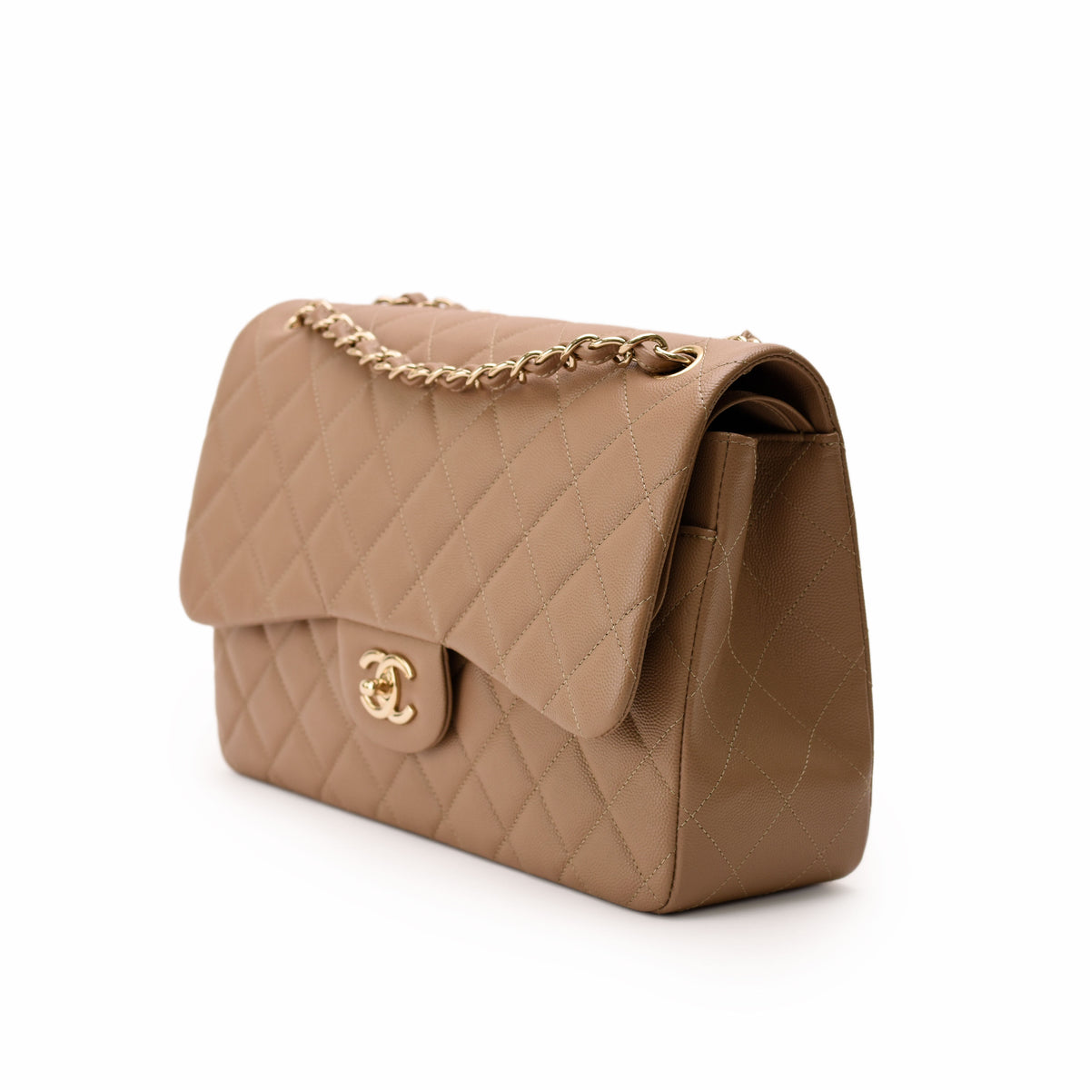 Beige quilted leather Chanel flap bag with gold chain strap, curated Pre-loved Luxury by Myluxe in Helsinki.