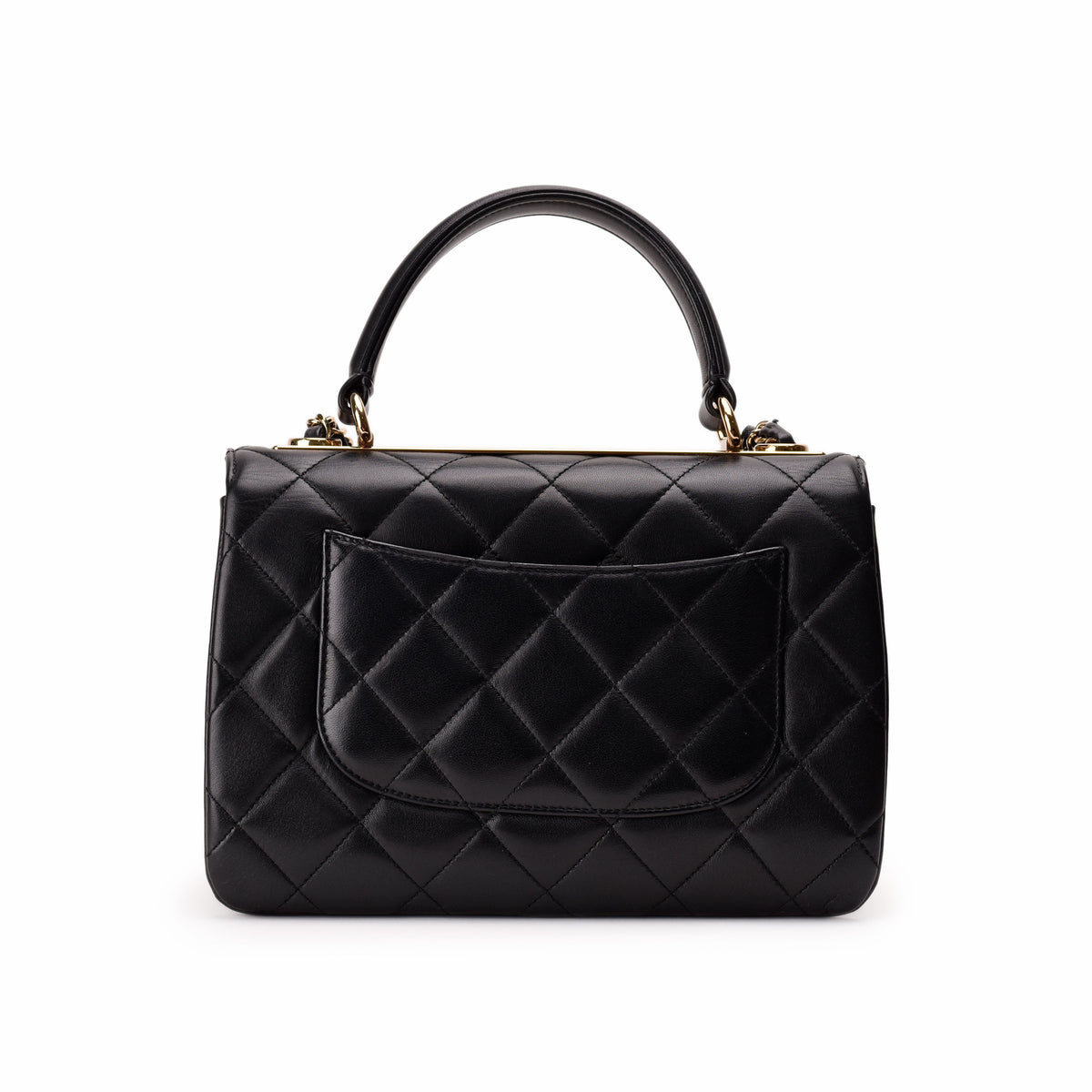 Black quilted leather Chanel handbag with top handle and gold hardware. curated Pre-loved Luxury by Myluxe in Helsinki.