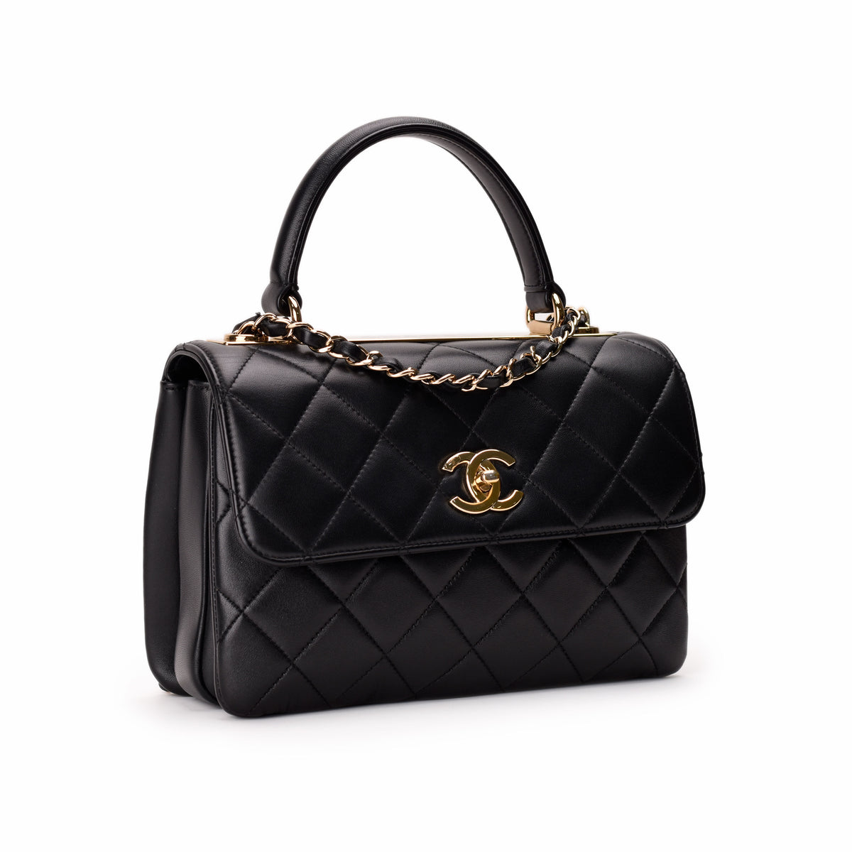 Black quilted leather Chanel handbag with gold-tone CC logo and chain detail, curated Pre-loved Luxury by Myluxe in Helsinki.