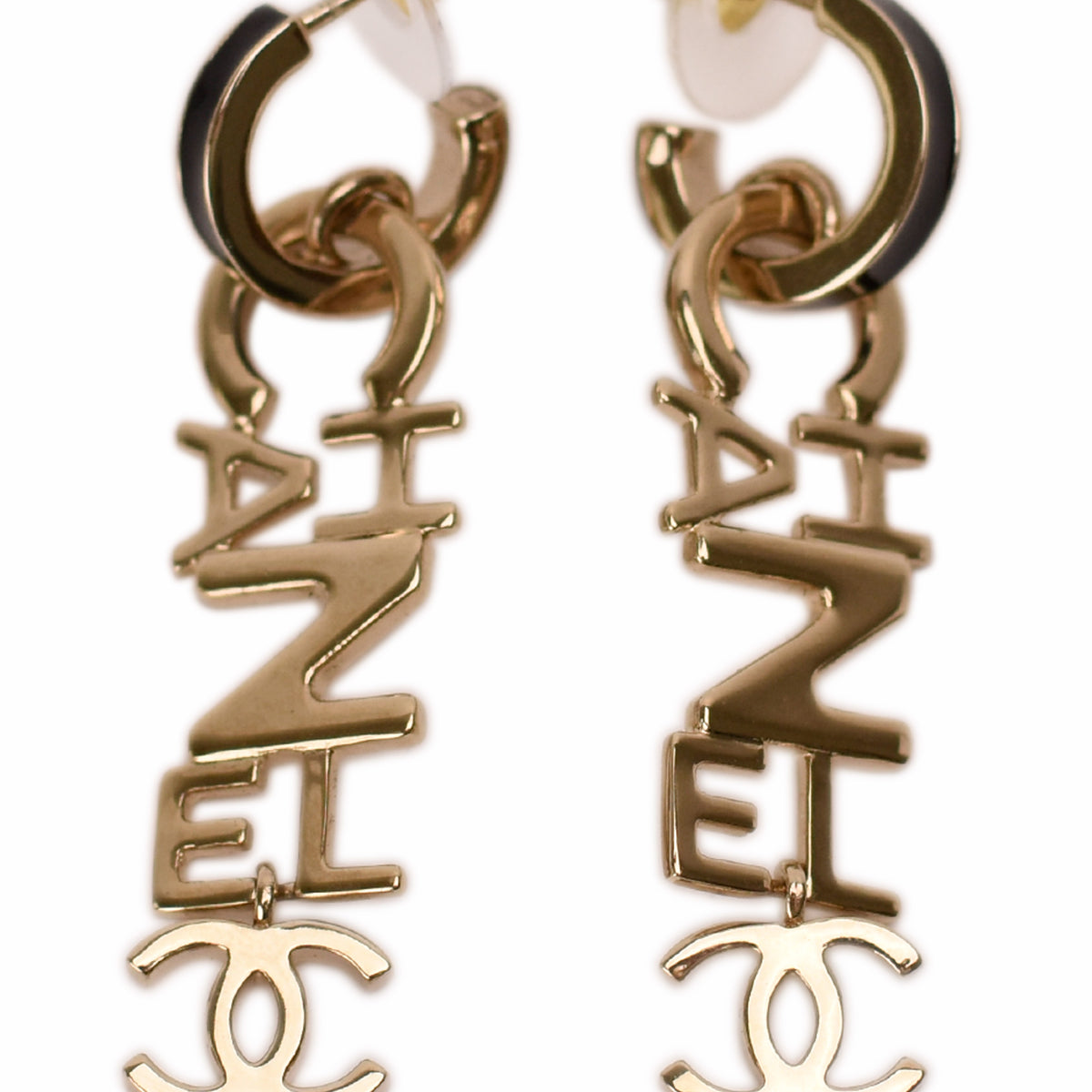 Gold-tone Chanel logo dangle earrings with interlocking CC motif. curated Pre-loved Luxury by Myluxe in Helsinki.
