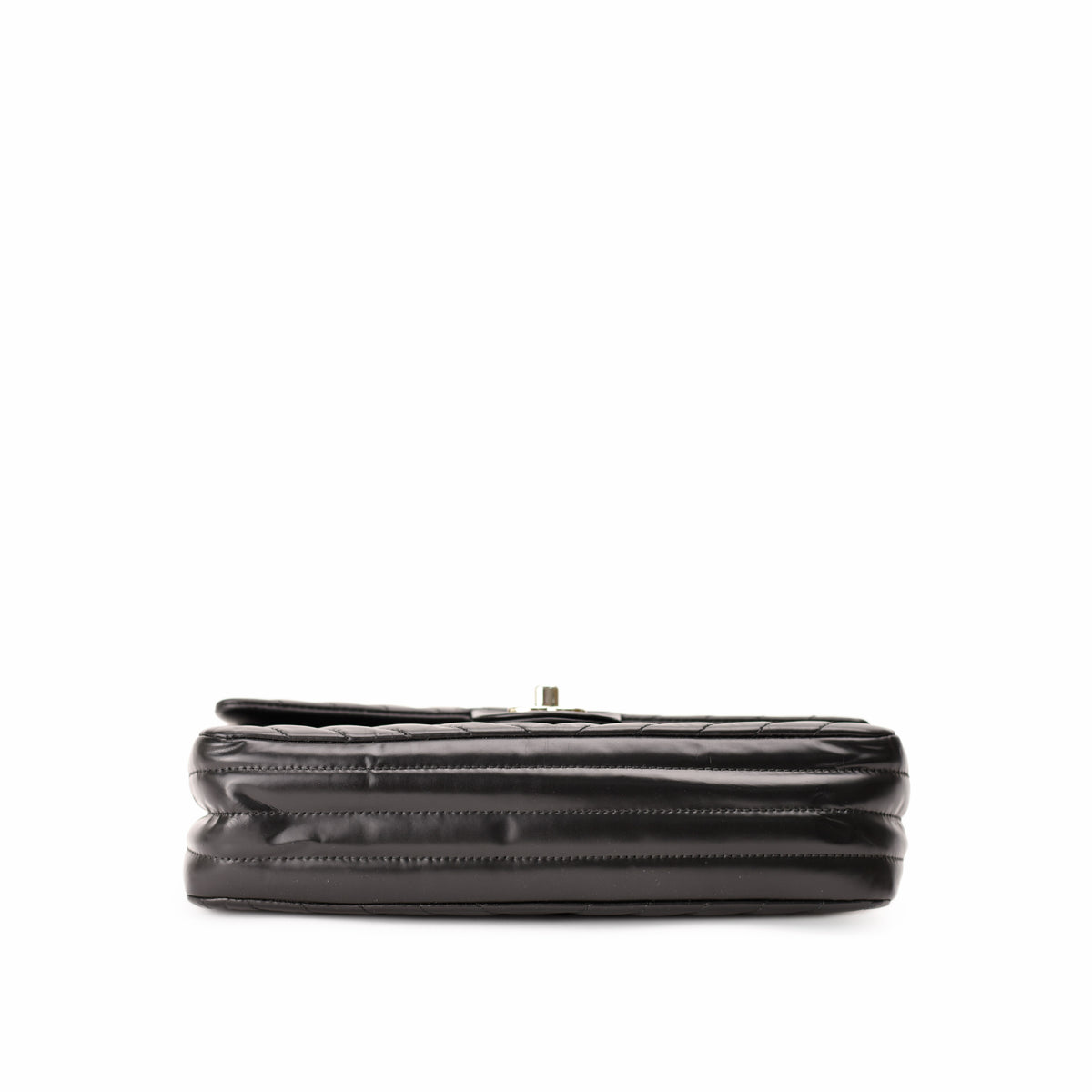 Black quilted leather Chanel flap bag. curated Pre-loved Luxury by Myluxe in Helsinki.