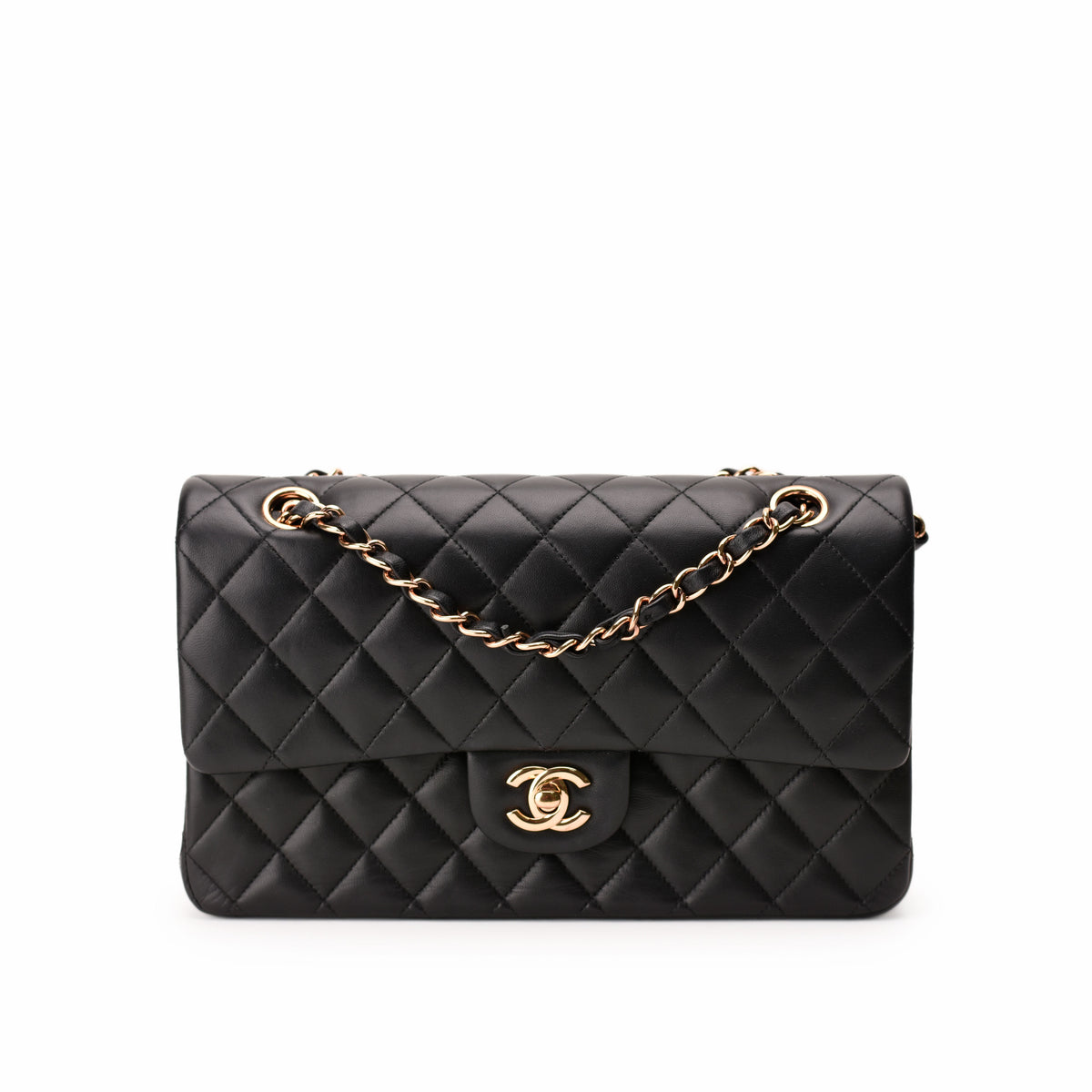 Black quilted lambskin Chanel flap bag with gold-tone chain strap, curated Pre-loved Luxury by Myluxe in Helsinki.