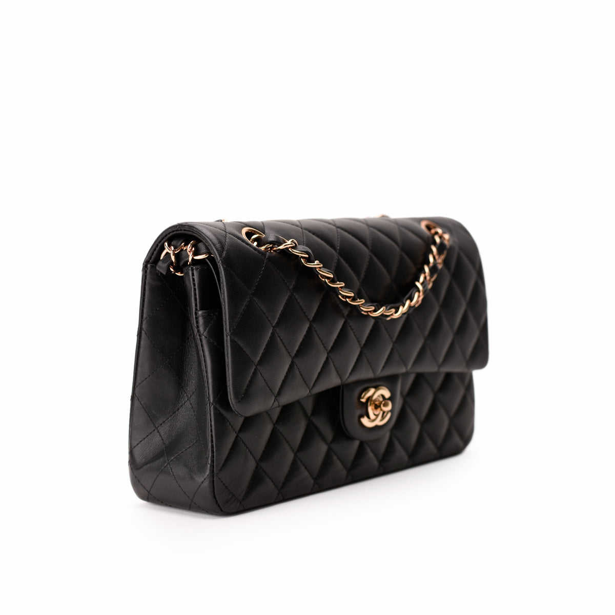 Black quilted lambskin Chanel flap bag with rose-gold-tone chain strap, curated Pre-loved Luxury by Myluxe in Helsinki.