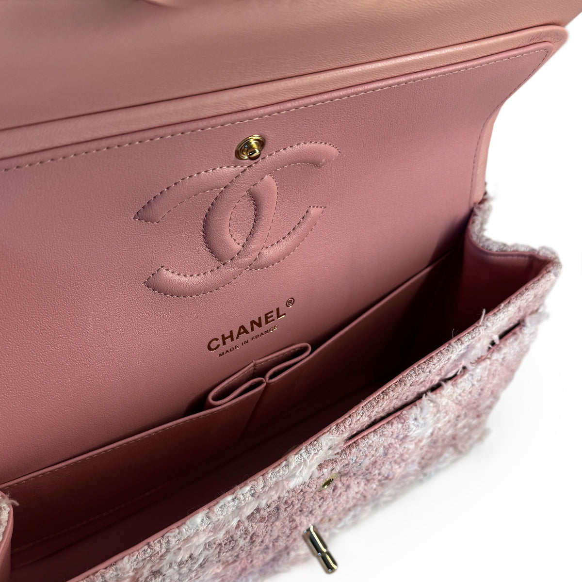 Chanel pink tweed flap bag with leather interior, curated Pre-loved Luxury by Myluxe in Helsinki.