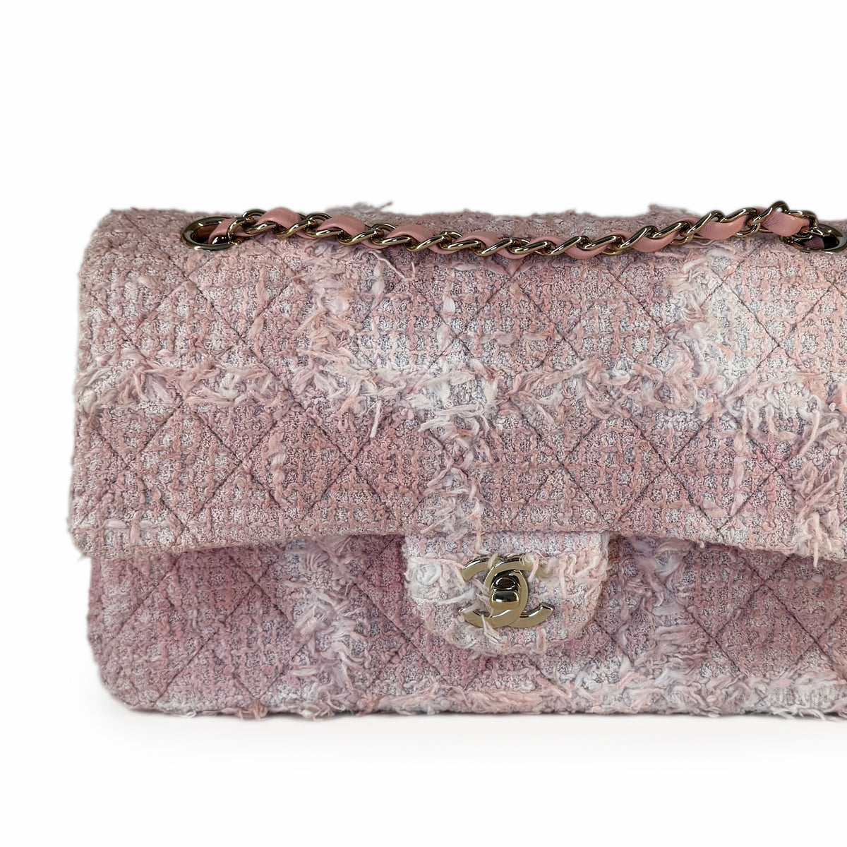 Pink quilted tweed Chanel handbag with gold chain strap, curated Pre-loved Luxury by Myluxe in Helsinki.
