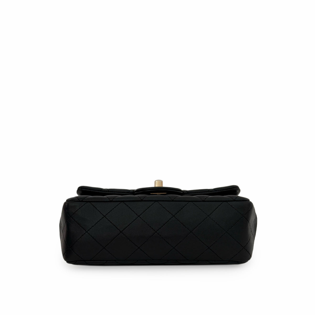 Black quilted leather luxury handbag with gold-tone clasp, curated Pre-loved Luxury by Myluxe in Helsinki.