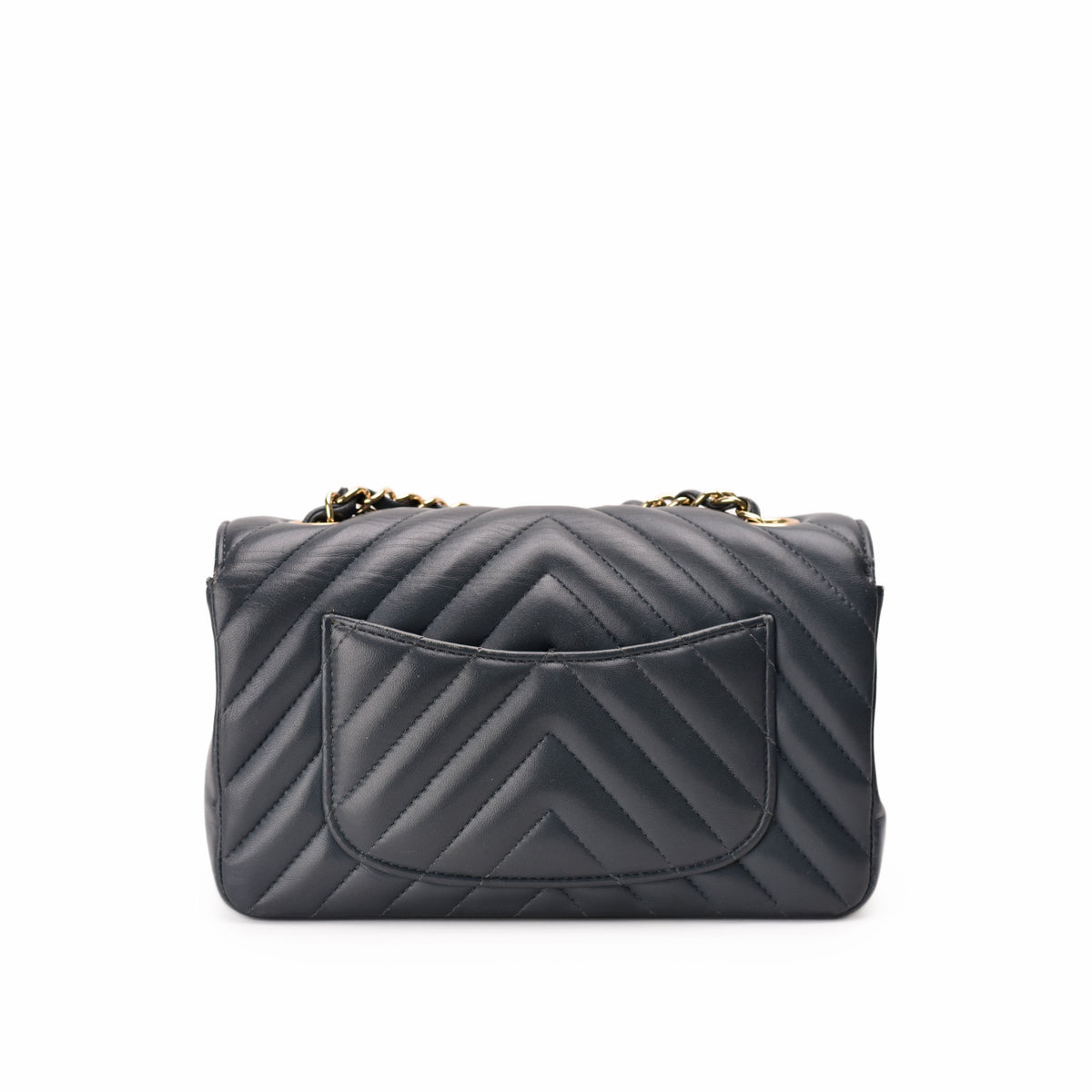 Black quilted leather chevron handbag with gold chain strap, curated Pre-loved Luxury by Myluxe in Helsinki.