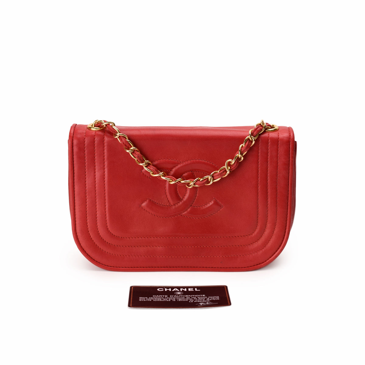 Red leather Chanel flap bag with gold chain strap, curated Pre-loved Luxury by Myluxe in Helsinki.