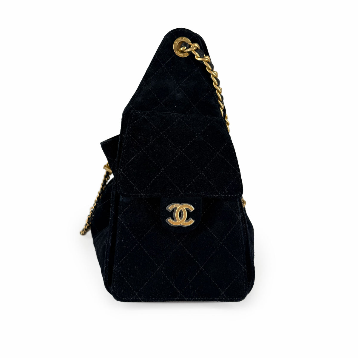 Black quilted velvet Chanel flap bag with gold-tone chain and CC logo, curated Pre-loved Luxury by Myluxe in Helsinki.