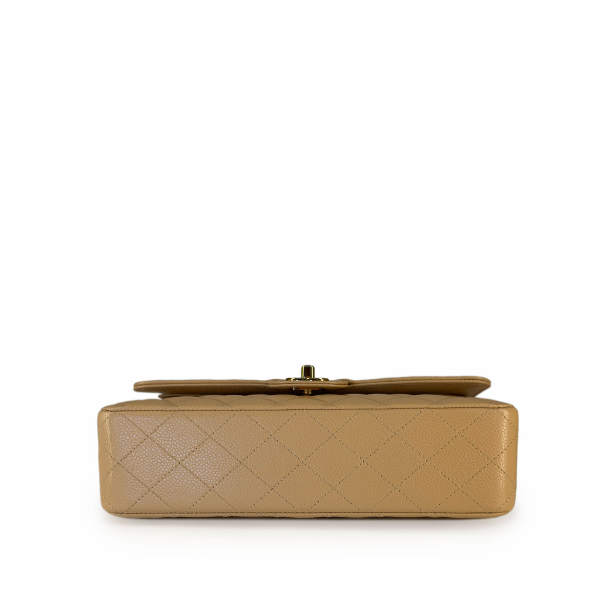 Tan quilted leather clutch bag with gold-tone clasp, curated Pre-loved Luxury by Myluxe in Helsinki.