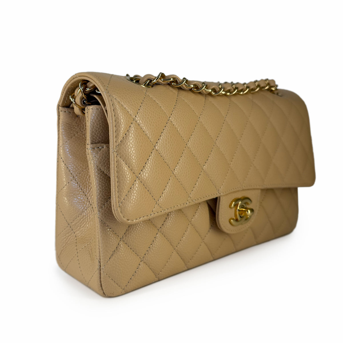 Tan quilted leather handbag with gold chain strap and logo clasp, curated Pre-loved Luxury by Myluxe in Helsinki.