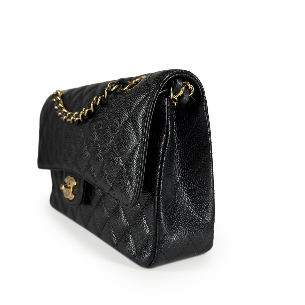 Black quilted caviar leather handbag with gold-tone chain strap, curated Pre-loved Luxury by Myluxe in Helsinki.