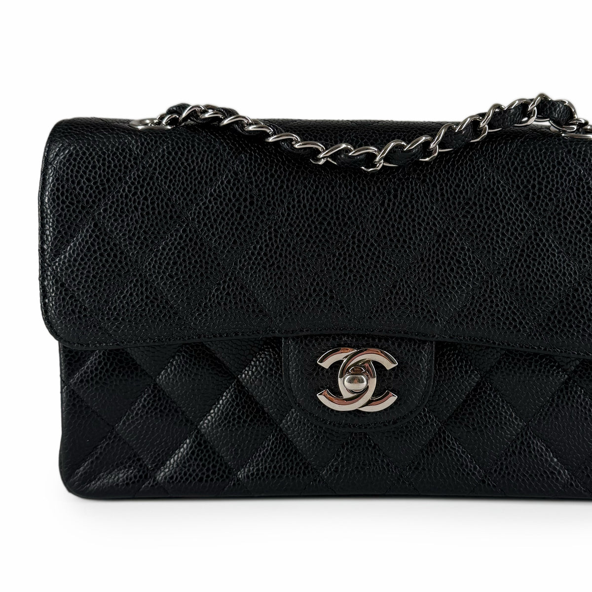 Black quilted caviar leather handbag with silver chain strap and CC logo, curated Pre-loved Luxury by Myluxe in Helsinki.