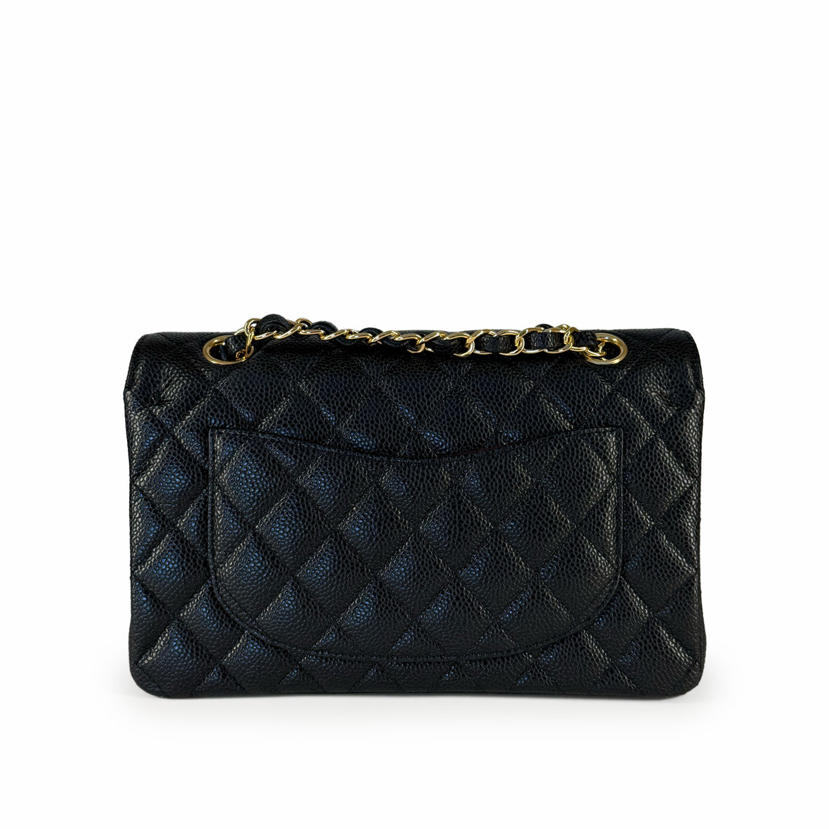 Black quilted caviar leather flap handbag with gold-tone chain strap, curated Pre-loved Luxury by Myluxe in Helsinki.