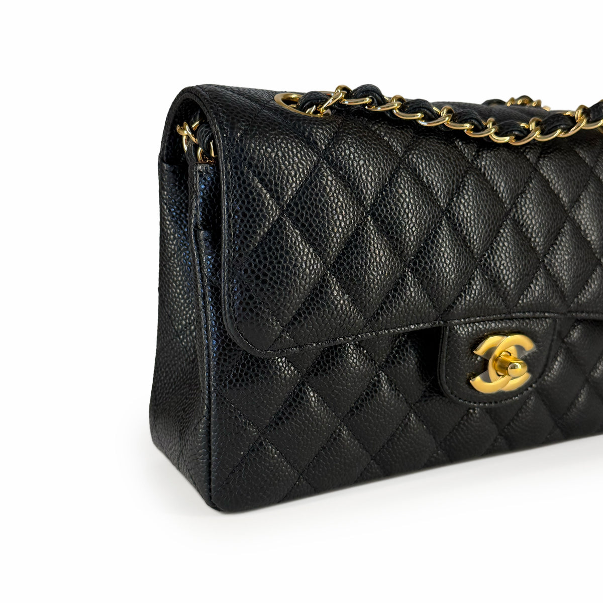 Black quilted caviar leather Chanel flap bag with gold hardware, curated Pre-loved Luxury by Myluxe in Helsinki.