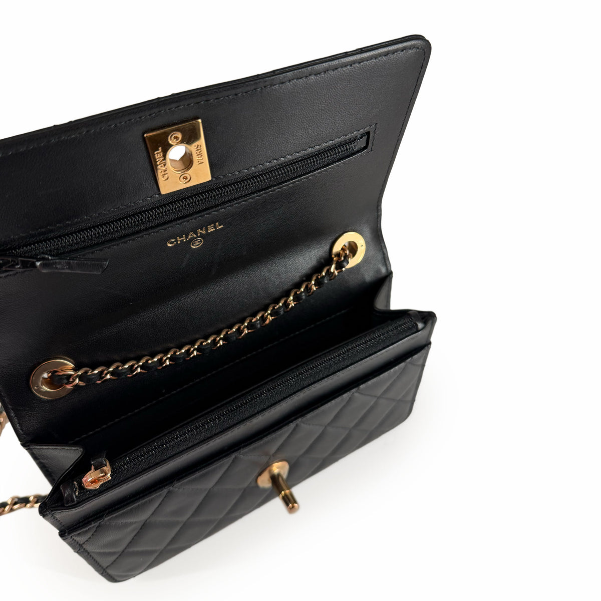 Black quilted leather Chanel flap bag with gold-tone hardware, curated Pre-loved Luxury by Myluxe in Helsinki.