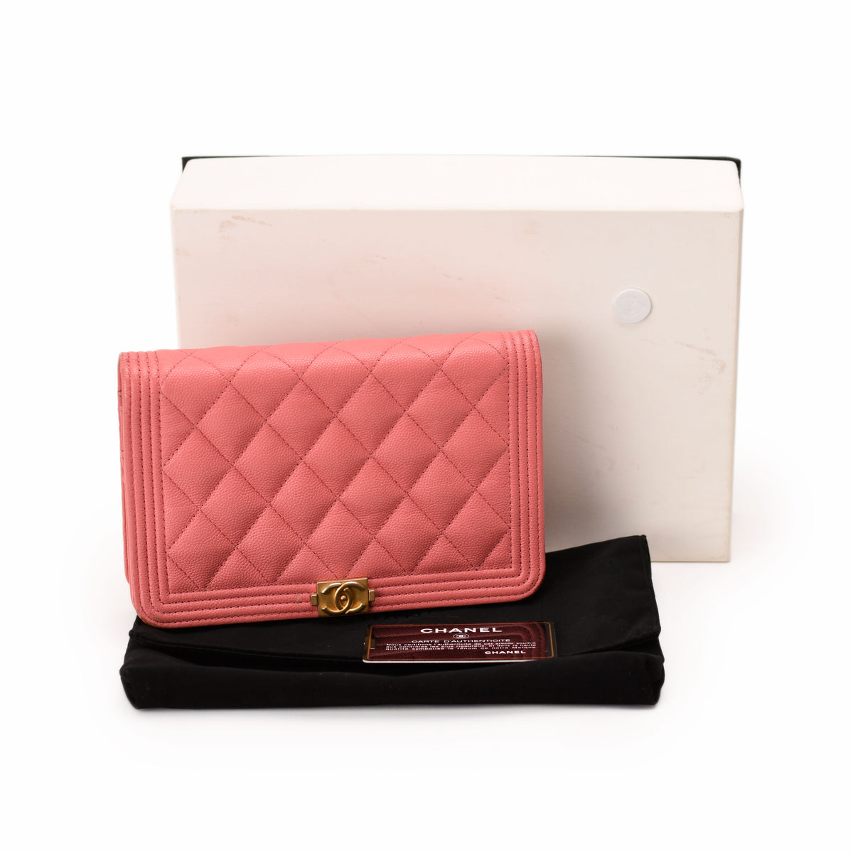 Pink quilted leather Chanel wallet with gold CC logo, curated Pre-loved Luxury by Myluxe in Helsinki.