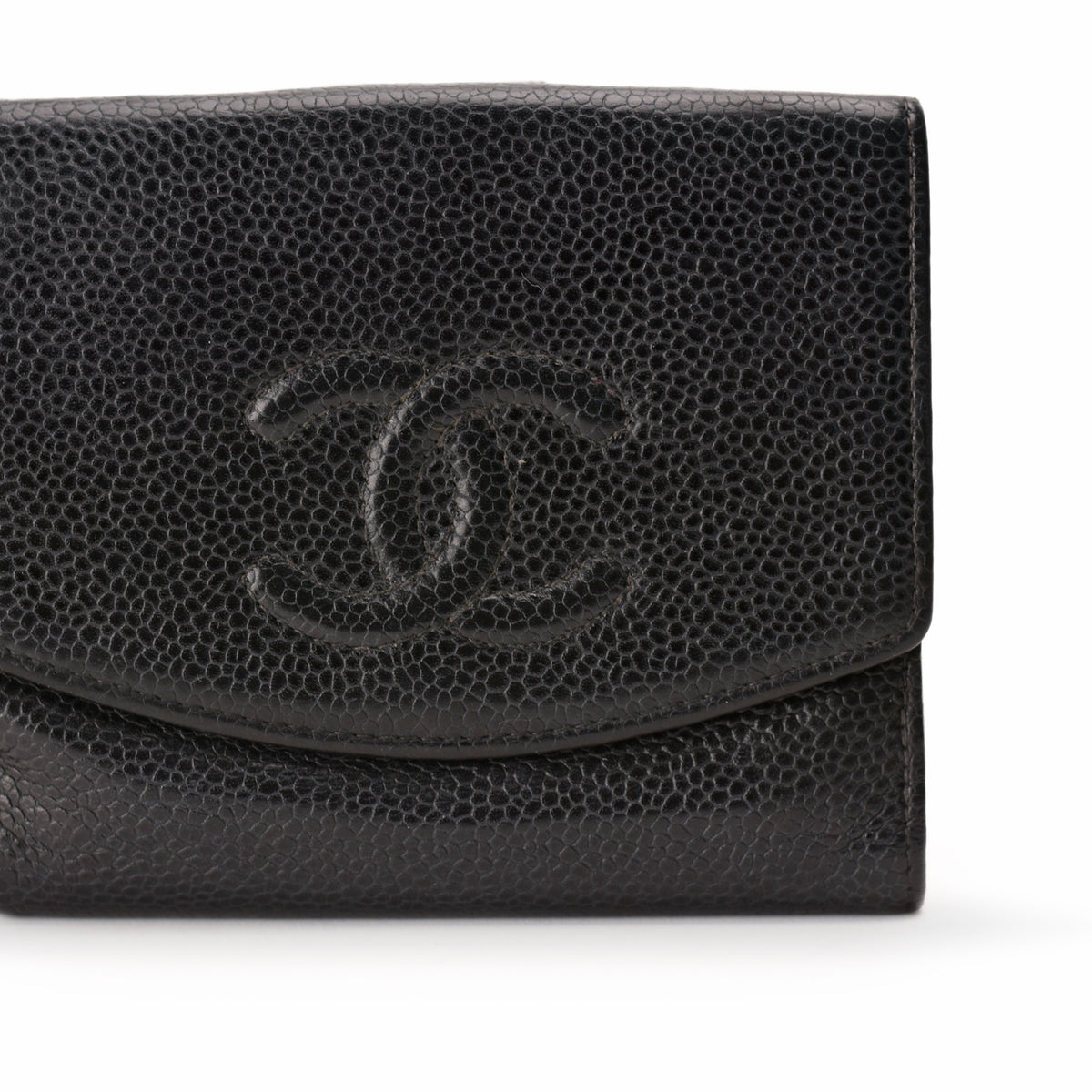 Black grained leather Chanel wallet with embossed CC logo, curated Pre-loved Luxury by Myluxe in Helsinki.