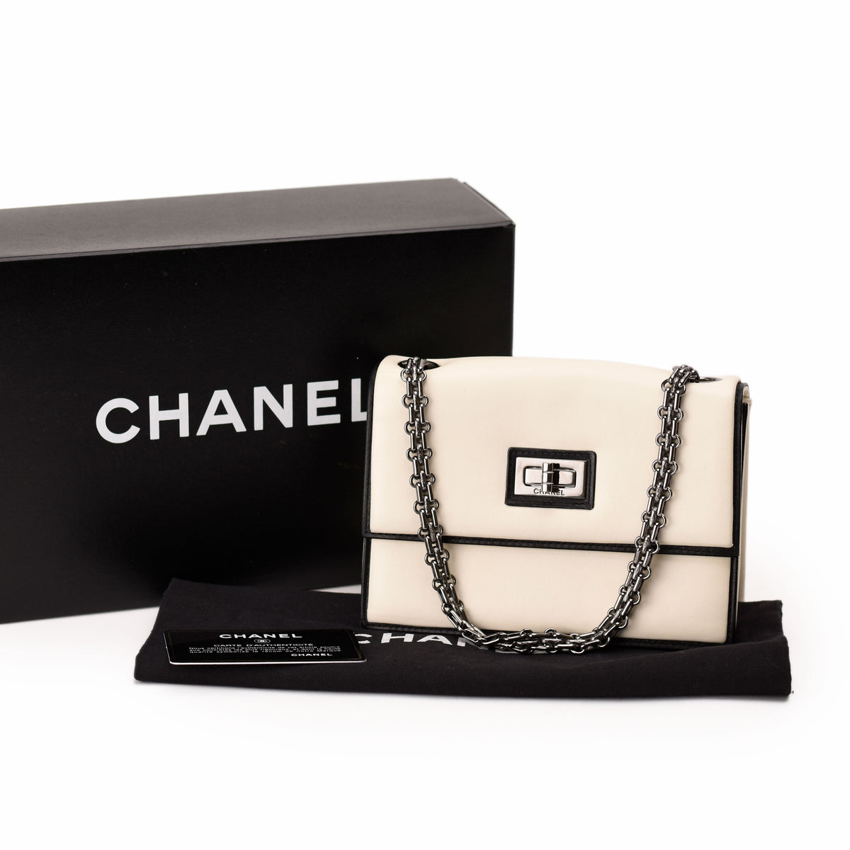Chanel cream leather flap bag with silver chain strap. curated Pre-loved Luxury by Myluxe in Helsinki.