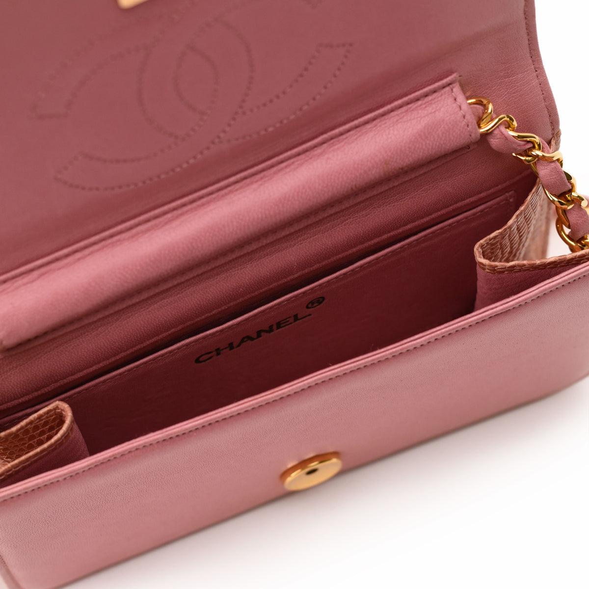 Pink Chanel leather flap bag with gold chain strap. curated Pre-loved Luxury by Myluxe in Helsinki.
