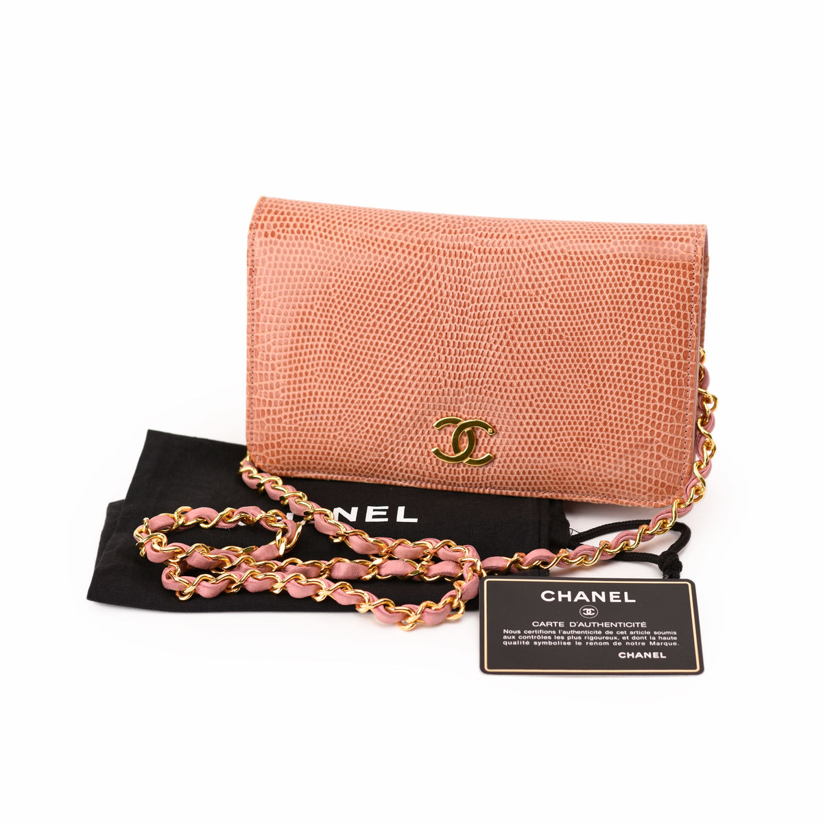 Pink Chanel python skin crossbody wallet with gold chain strap. curated Pre-loved Luxury by Myluxe in Helsinki.
