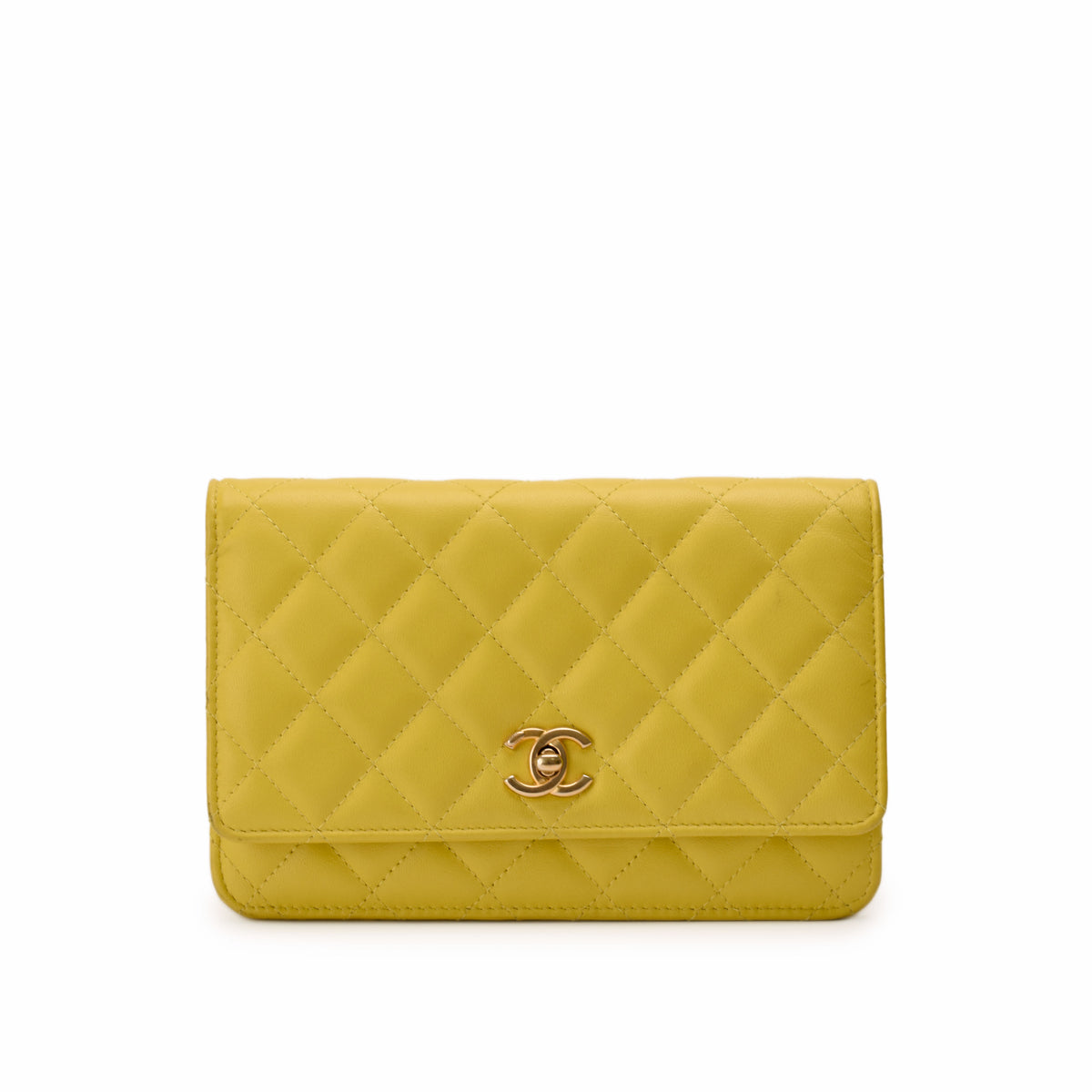 Yellow quilted lambskin Chanel wallet with gold-tone CC logo, curated Pre-loved Luxury by Myluxe in Helsinki.