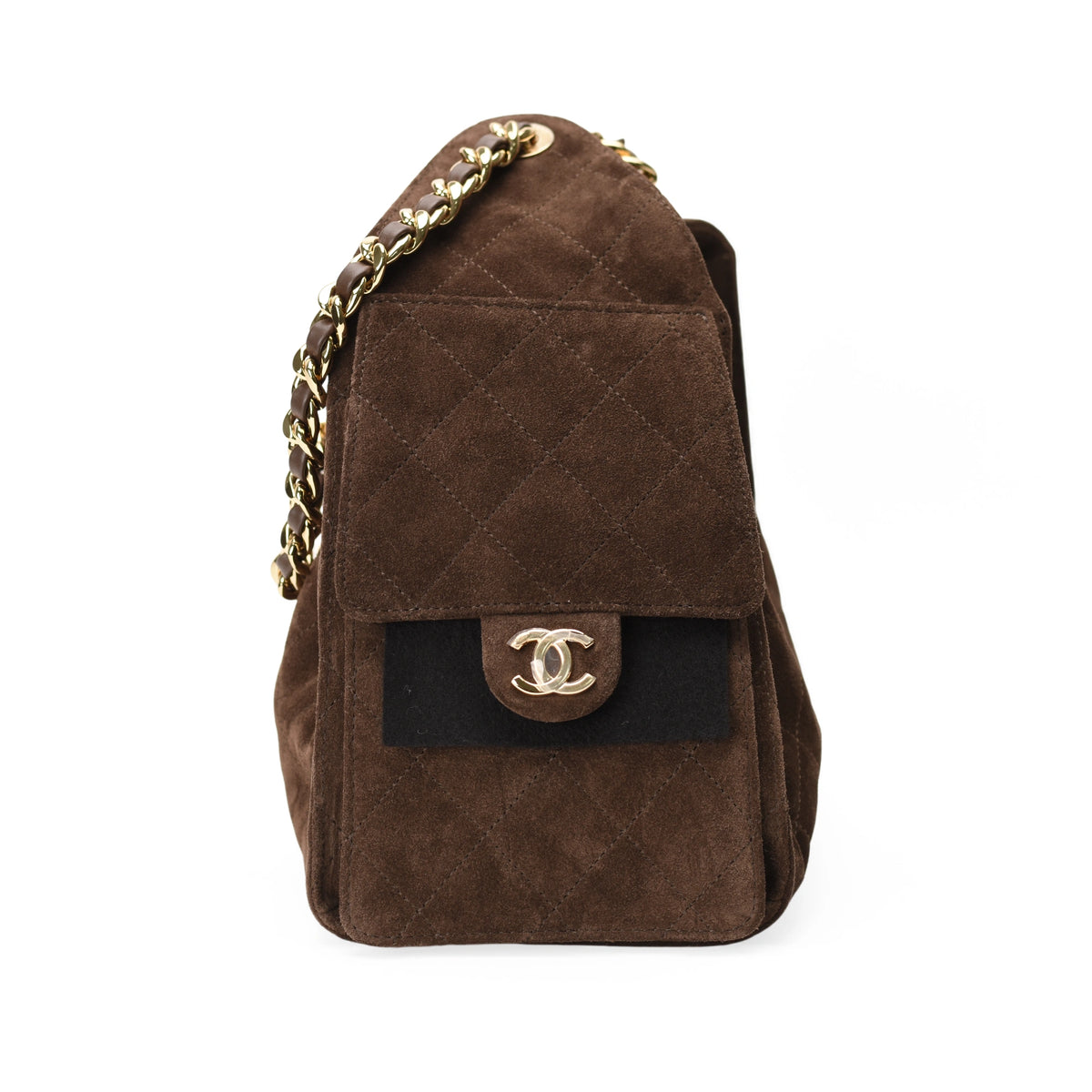Chanel 25 small bag in brown quilted suede with gold hardware. curated Pre-loved Luxury by Myluxe in Helsinki.