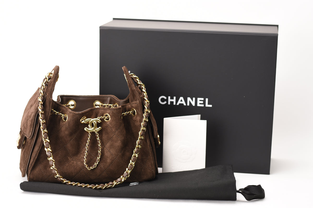 Chanel 25 Mini Bag in brown suede with gold hardware and box. curated Pre-loved Luxury by Myluxe in Helsinki.
