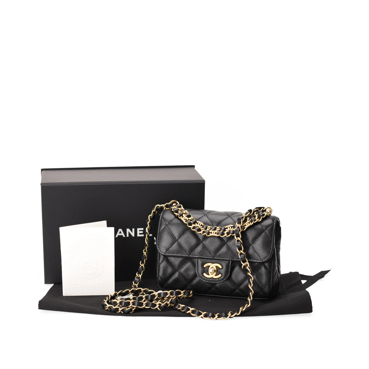 Chanel Small Coco First Flap Black Caviar leather handbag with gold chain strap. curated Pre-loved Luxury by Myluxe in Helsinki.