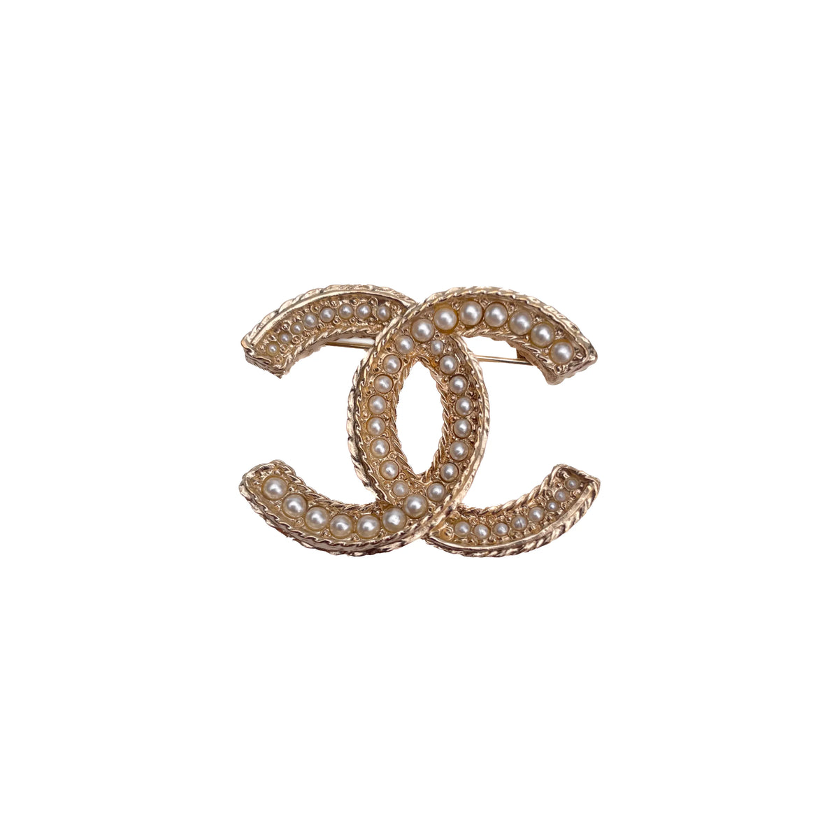 Gold-tone Chanel interlocking C brooch embellished with white pearls, curated Pre-loved Luxury by Myluxe in Helsinki.