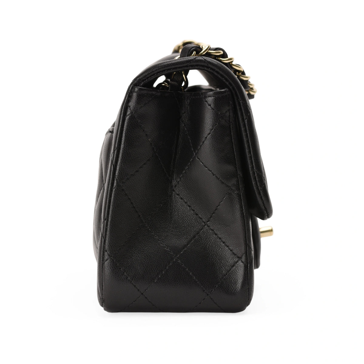 Black quilted lambskin Chanel handbag with gold chain strap. curated Pre-loved Luxury by Myluxe in Helsinki.