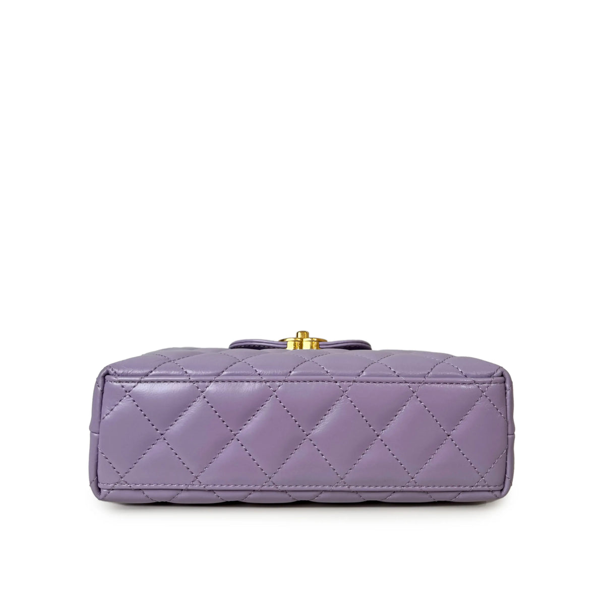 Lavender quilted leather clutch with gold-tone clasp, curated Pre-loved Luxury by Myluxe in Helsinki.
