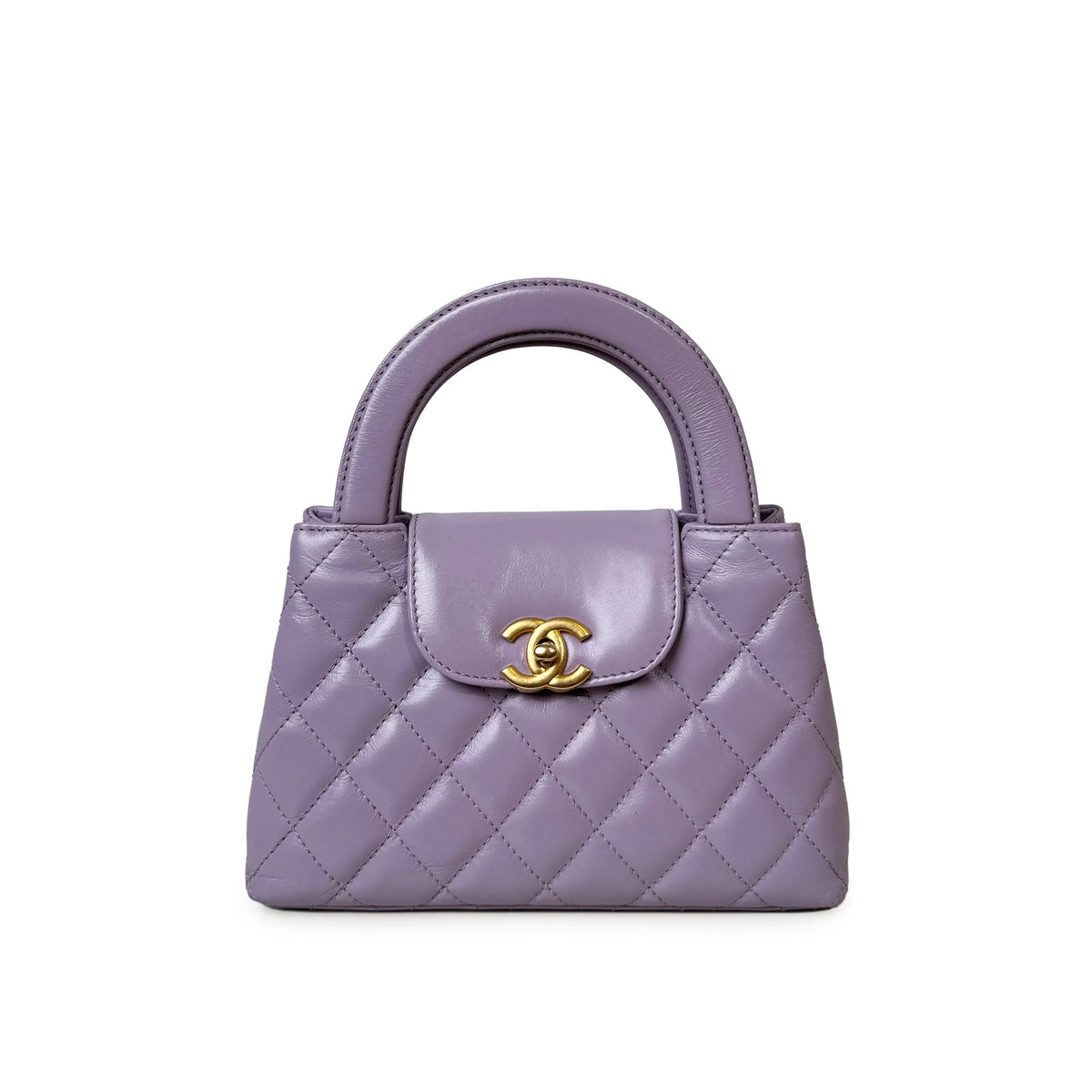 Lavender quilted leather handbag with gold-tone CC clasp, curated Pre-loved Luxury by Myluxe in Helsinki.