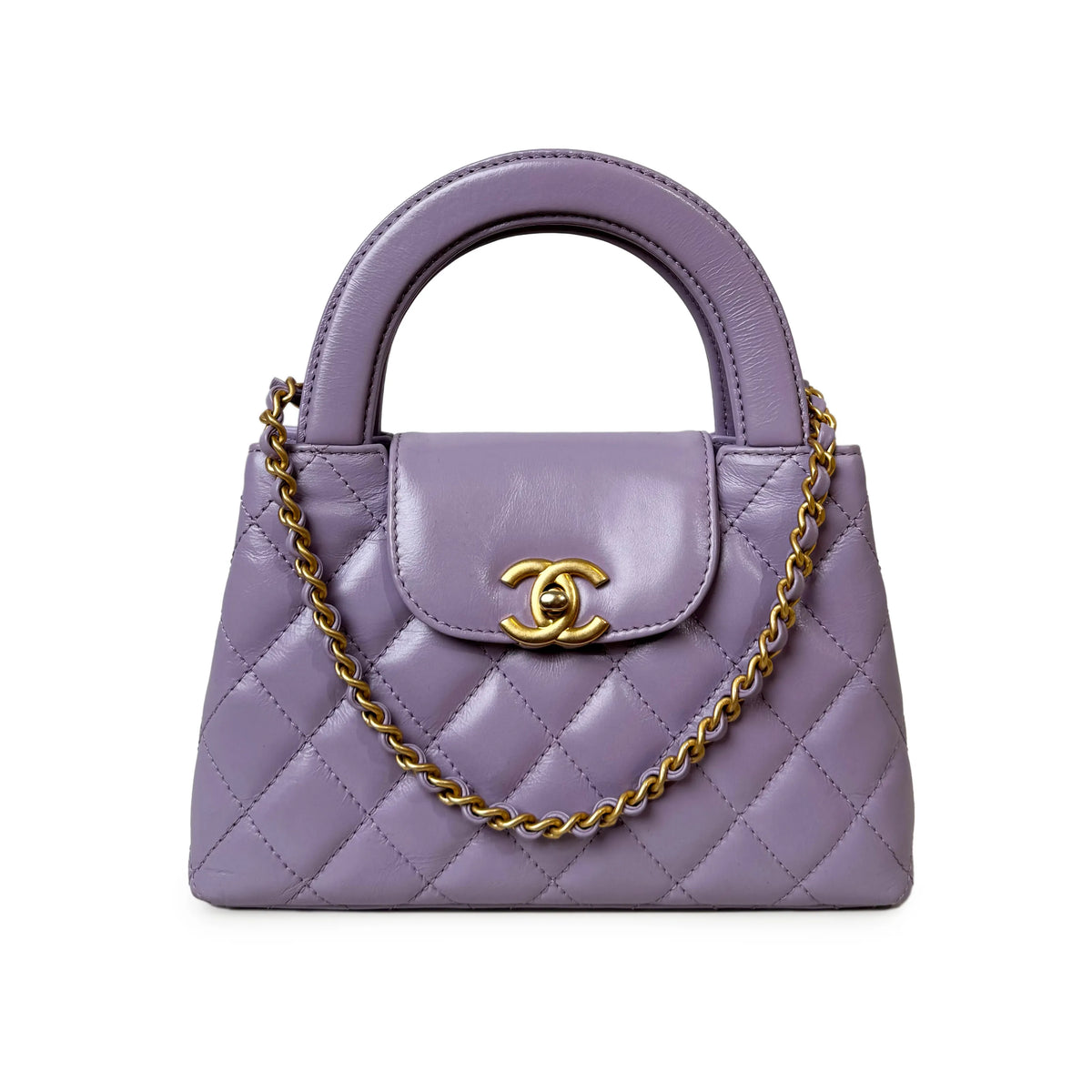 Lavender quilted leather Chanel handbag with gold chain strap, curated Pre-loved Luxury by Myluxe in Helsinki.