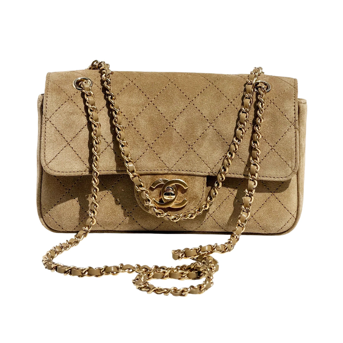Chanel beige suede quilted flap bag with gold chain strap. curated Pre-loved Luxury by Myluxe in Helsinki.