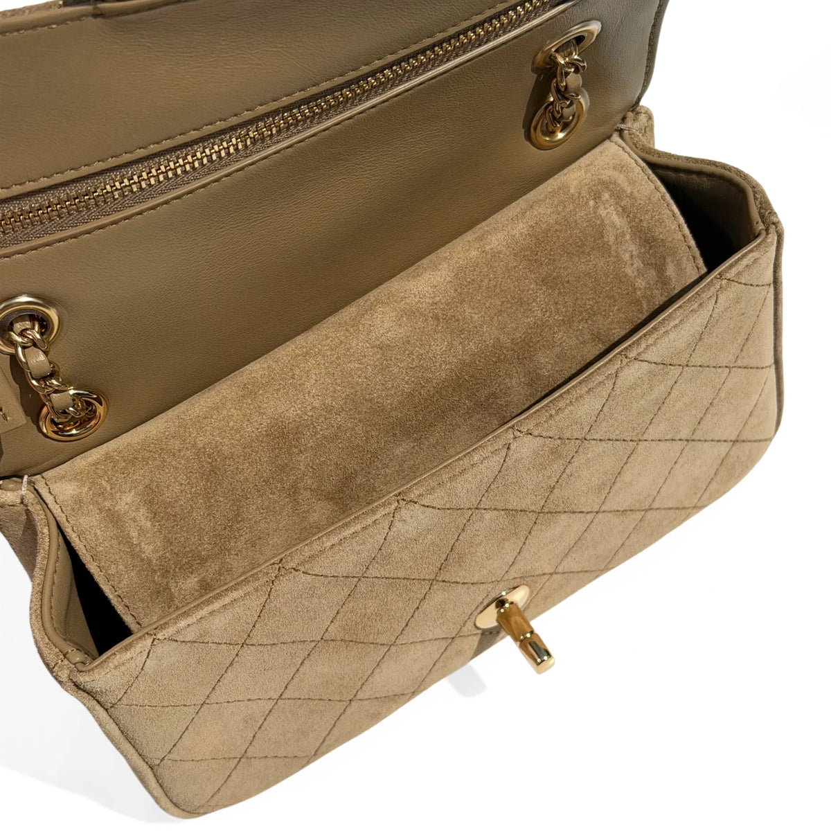 Beige quilted suede luxury handbag with gold-tone hardware. curated Pre-loved Luxury by Myluxe in Helsinki.