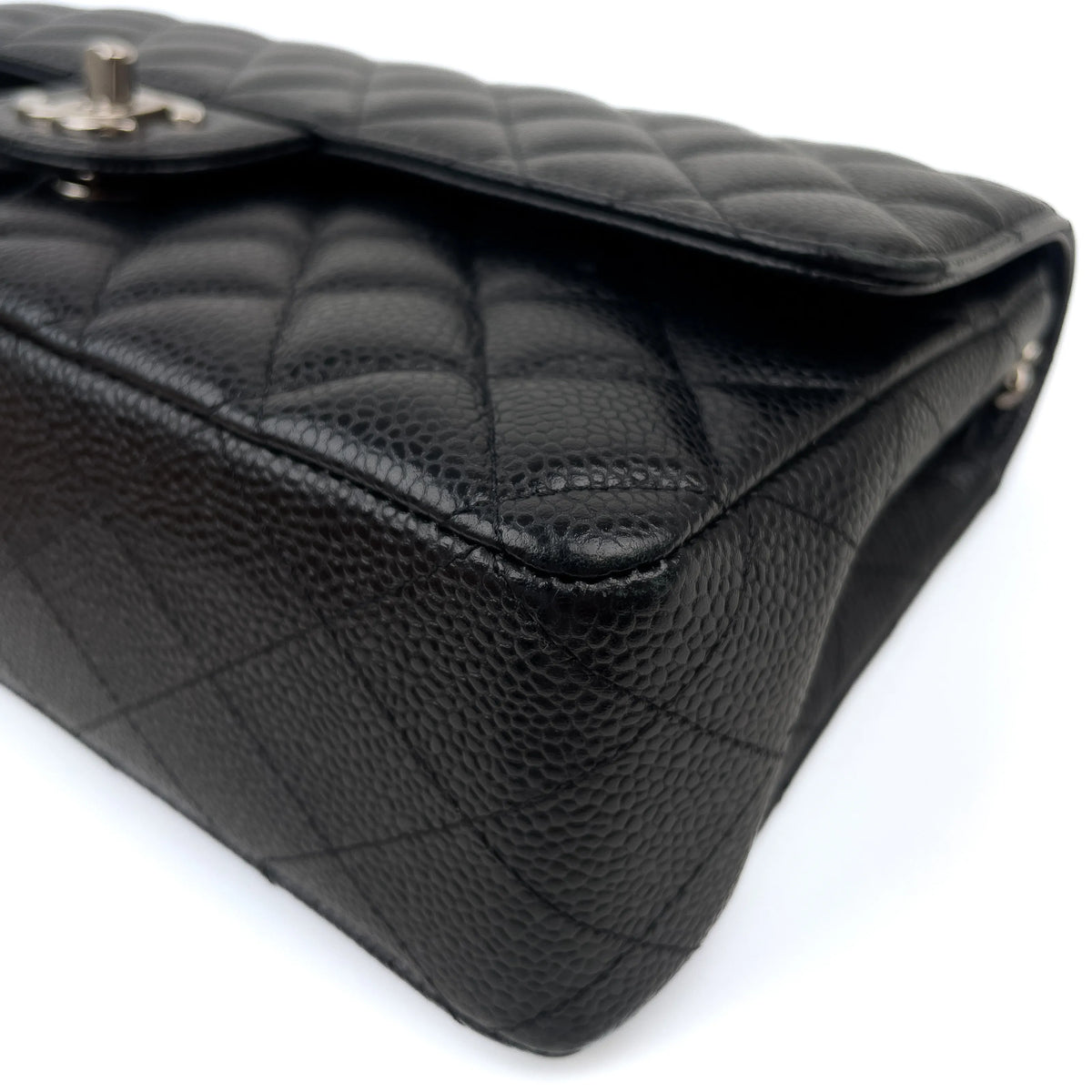 Black quilted leather designer handbag, curated Pre-loved Luxury by Myluxe in Helsinki.