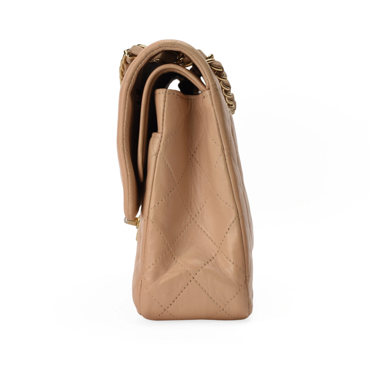 Chanel Timeless medium beige lambskin handbag with gold hardware. curated Pre-loved Luxury by Myluxe in Helsinki.