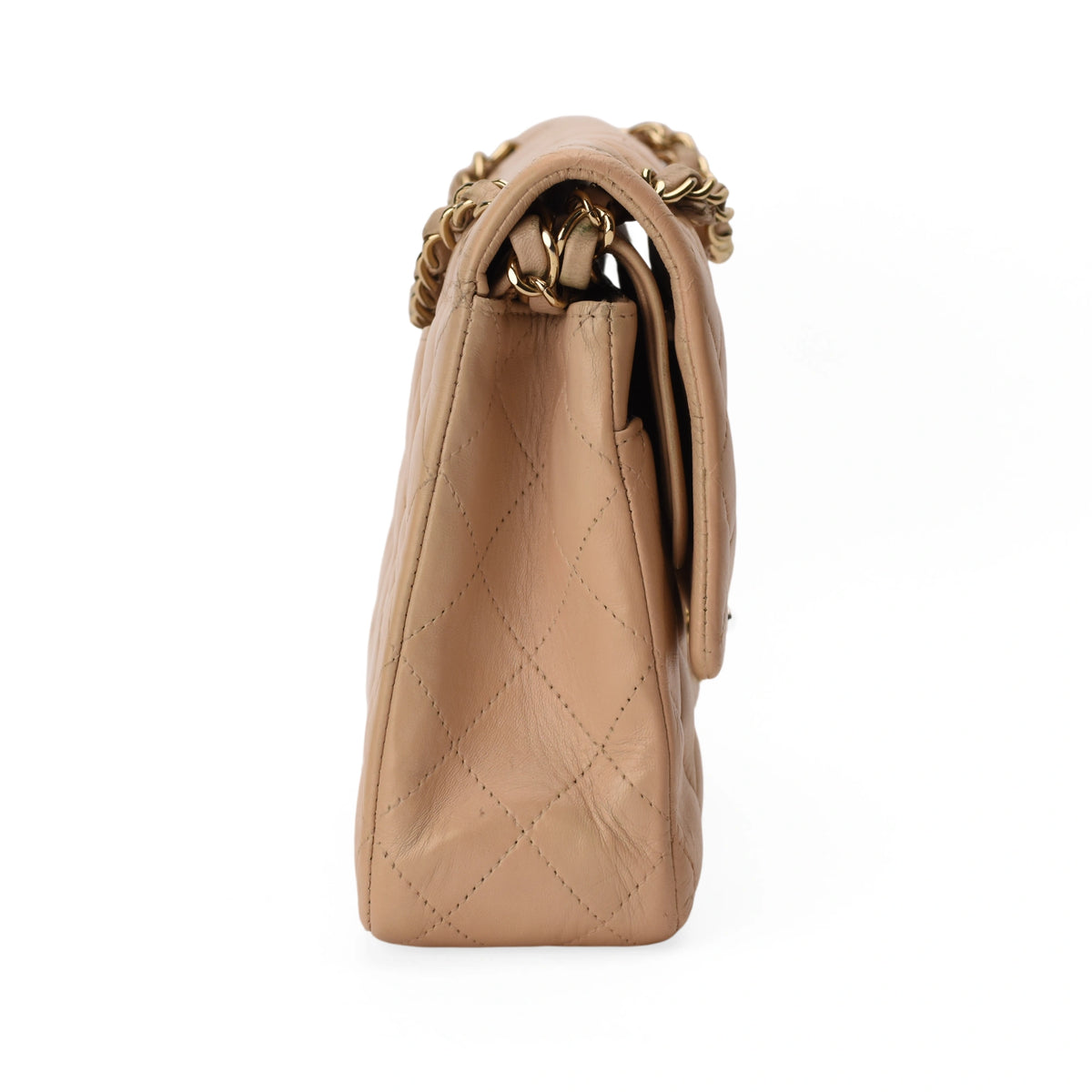 Chanel Timeless Medium Beige Lambskin handbag with gold hardware. curated Pre-loved Luxury by Myluxe in Helsinki.