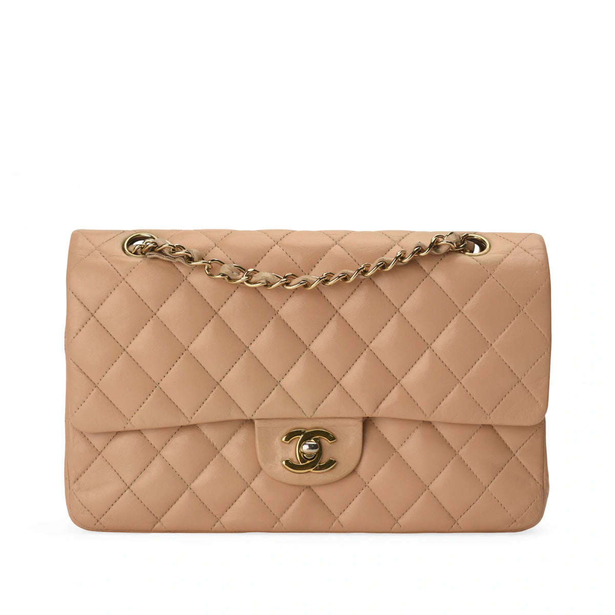 Chanel Timeless medium beige lambskin handbag with gold hardware. curated Pre-loved Luxury by Myluxe in Helsinki.