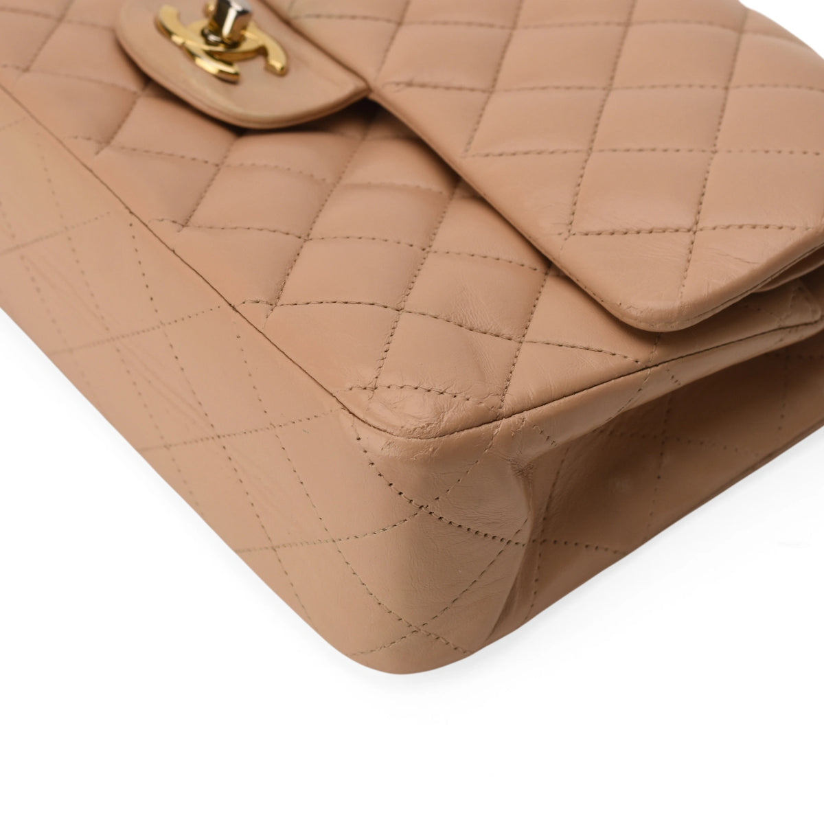 Chanel Timeless medium beige lambskin leather handbag with gold hardware. curated Pre-loved Luxury by Myluxe in Helsinki.