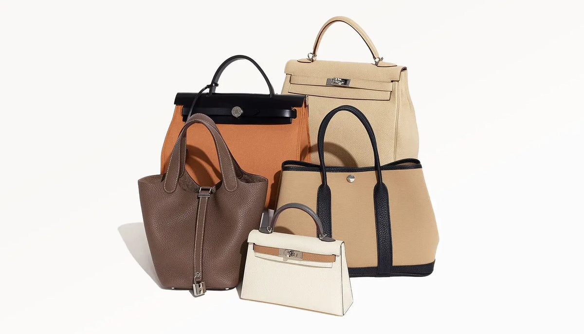 Collection of luxury designer handbags in various colors and styles.