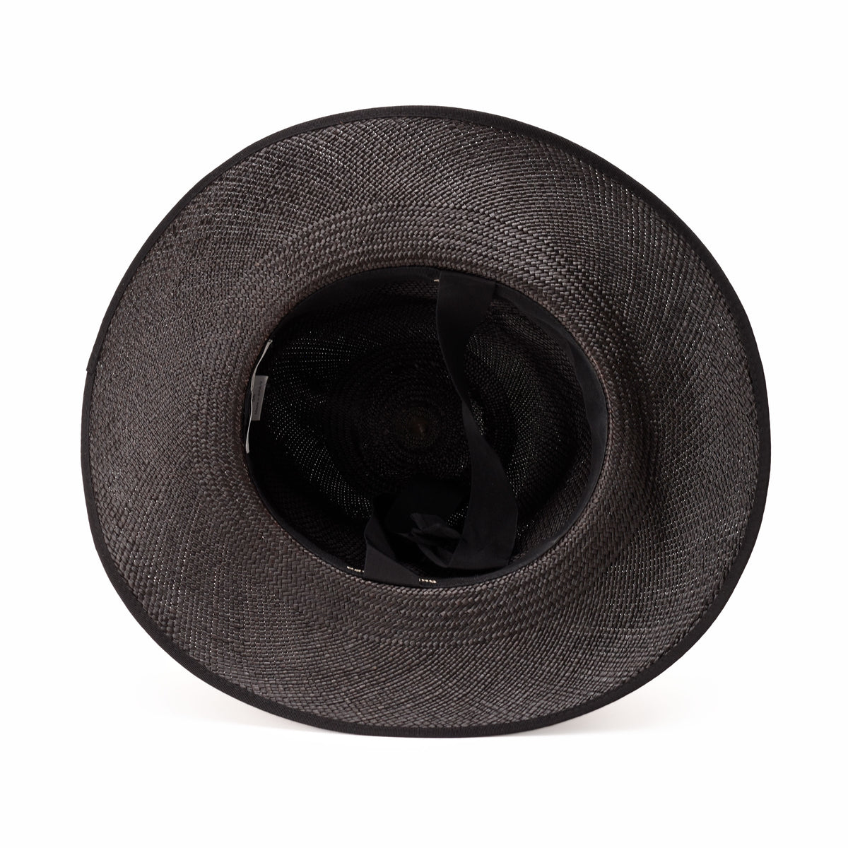 Black woven straw fedora hat with wide brim, curated Pre-loved Luxury by Myluxe in Helsinki.
