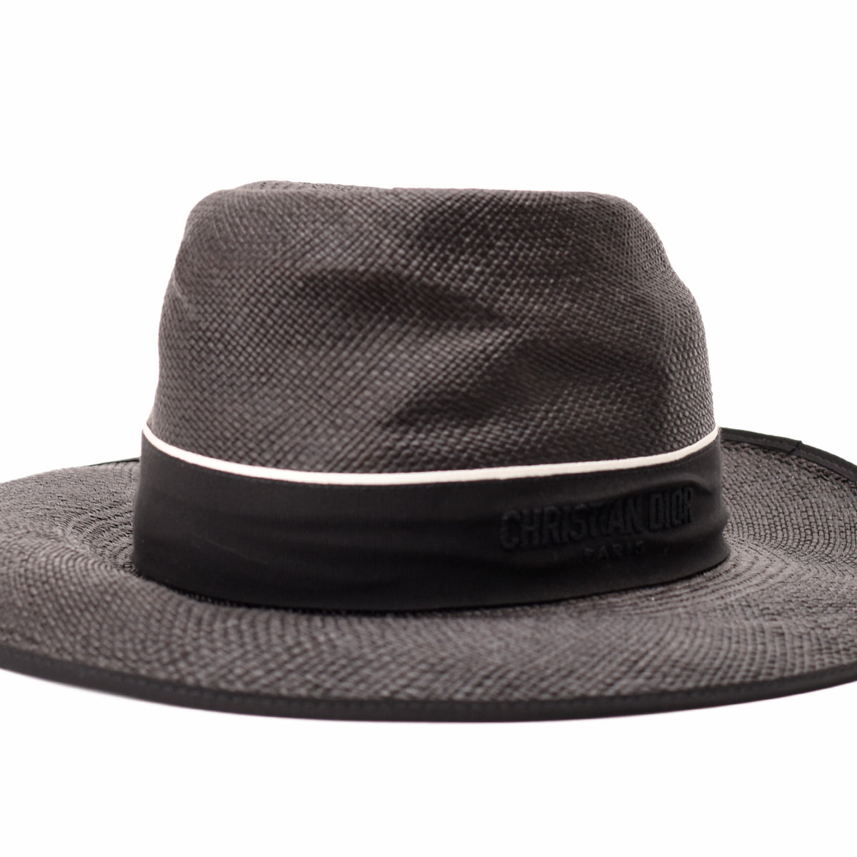 Black Christian Dior straw fedora hat with white trim, curated Pre-loved Luxury by Myluxe in Helsinki.